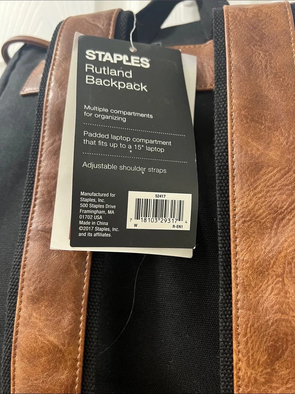 Vintage-Style Black Canvas Backpack with Brown Trim